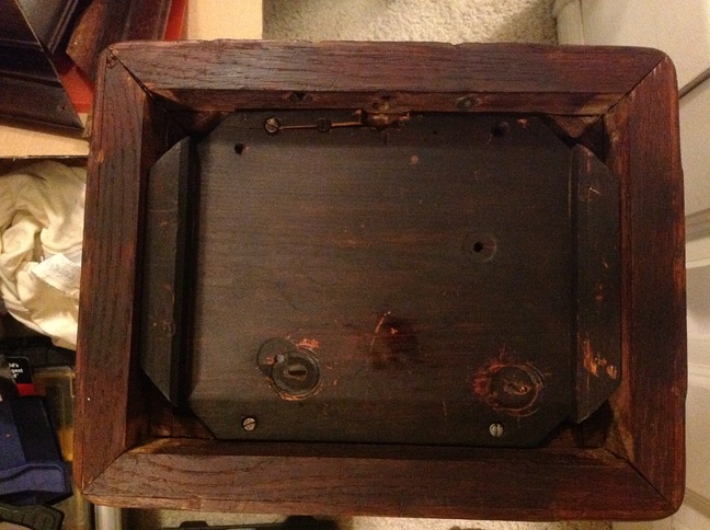 Underside of clock case